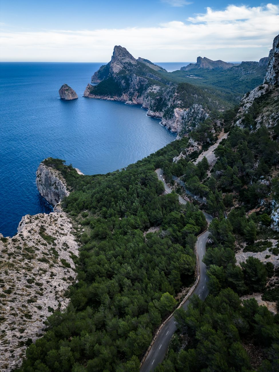 Weather and seasonal views over the rocky cliffs of Cala Figuera